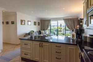 A kitchen or kitchenette at 17 The Dune Jeffreys Bay