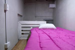 Postel nebo postele na pokoji v ubytování Medio Mundo