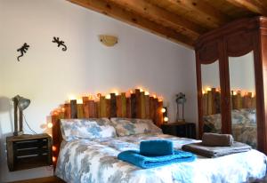 Postel nebo postele na pokoji v ubytování Casa rural La abuela Nines