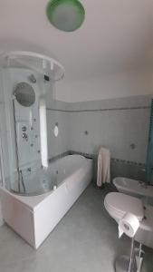 Kúpeľňa v ubytovaní Kalipè Dolomiti