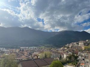 a view of a city with a mountain in the background at Ai house boutique in Castel di Sangro