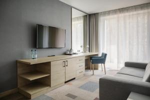 TV a/nebo společenská místnost v ubytování Magnus Resort