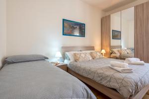 Posteľ alebo postele v izbe v ubytovaní Sardinia rooms