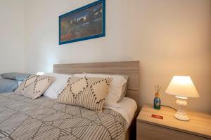 Posteľ alebo postele v izbe v ubytovaní Sardinia rooms