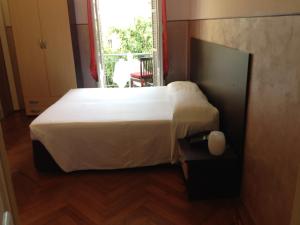 Postel nebo postele na pokoji v ubytování Hotel Liberty