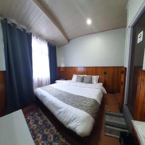 Postel nebo postele na pokoji v ubytování Kanari B&B