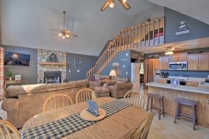 a living room with a table with a hat on it at Scenic HighBearNation Lodge Near Hiking! in Murphy