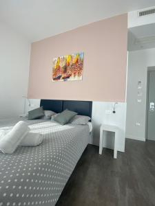 Voodi või voodid majutusasutuse Hotel Aurora & Appartamenti toas
