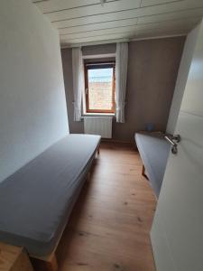 Postel nebo postele na pokoji v ubytování Ferienwohnung Hofmann