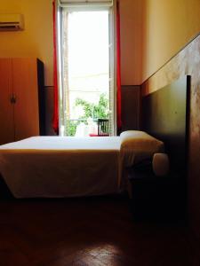 Postel nebo postele na pokoji v ubytování Hotel Liberty