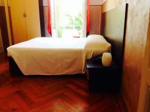 Postel nebo postele na pokoji v ubytování Hotel Liberty