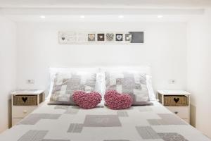 Ένα ή περισσότερα κρεβάτια σε δωμάτιο στο Mammare Sorrento Loft