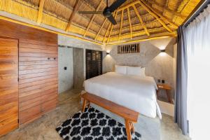 Postel nebo postele na pokoji v ubytování Maya Tulum By G Hotels