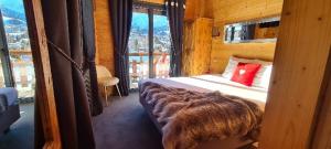 Postel nebo postele na pokoji v ubytování Hôtel Spa L'Oxygène