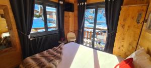 Postel nebo postele na pokoji v ubytování Hôtel Spa L'Oxygène