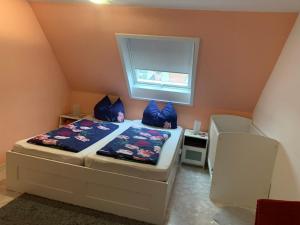 Postel nebo postele na pokoji v ubytování Ferienwohnung Feist