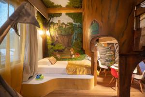 Posteľ alebo postele v izbe v ubytovaní Paradisio Baby & Kinder Hotel