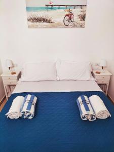 Ein Bett oder Betten in einem Zimmer der Unterkunft GUEST HOUSE LE BOFFE
