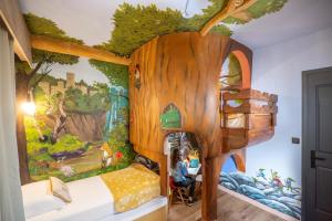 Posteľ alebo postele v izbe v ubytovaní Paradisio Baby & Kinder Hotel