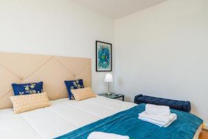 Postel nebo postele na pokoji v ubytování Casa do Pinhal