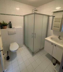 Ett badrum på Familie appartement hartje Knokke met optie parking