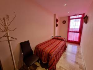 Posteľ alebo postele v izbe v ubytovaní Duplex Carma + 33 fotografií
