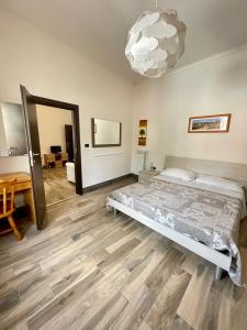 Ένα ή περισσότερα κρεβάτια σε δωμάτιο στο Il Feudo