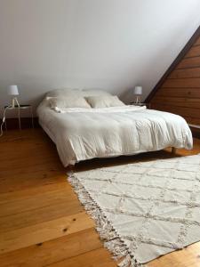 Cama o camas de una habitación en Chalet du Trèfle