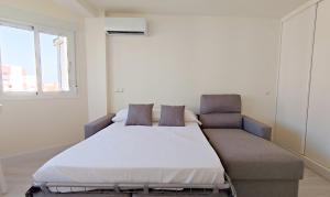 Postel nebo postele na pokoji v ubytování Gaviotas Beach - Alojamientos La Torre