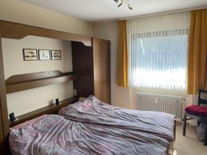 Postel nebo postele na pokoji v ubytování Urlaub im Schwarzwald! GHP440