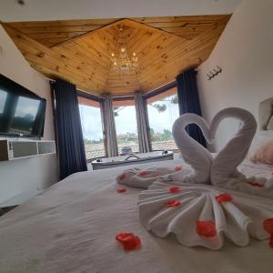 Recanto dos Moinhos - Boutique Hotel客房内的一张或多张床位