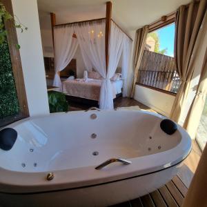 Recanto dos Moinhos - Boutique Hotel客房内的一张或多张床位