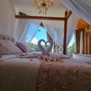 Recanto dos Moinhos - Boutique Hotel客房内的一张或多张床位