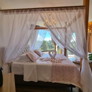 Recanto dos Moinhos - Boutique Hotel客房内的一张或多张床位