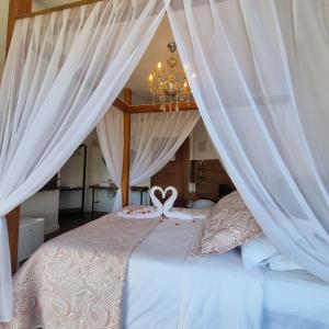 Recanto dos Moinhos - Boutique Hotel客房内的一张或多张床位