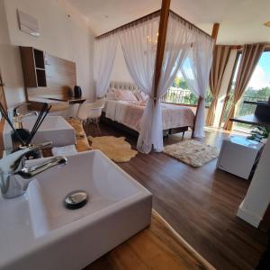 Recanto dos Moinhos - Boutique Hotel客房内的一张或多张床位