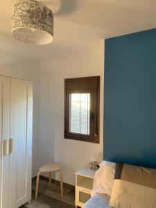 Postel nebo postele na pokoji v ubytování Apartamento Rural 2 Casa Bergua