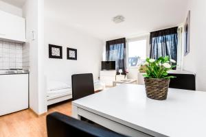 Cuina o zona de cuina de Budget Apartment Köln 9 fotos més