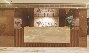 a store front of aveven in a building at Treebo Tryst Seven Lake View in Hyderabad