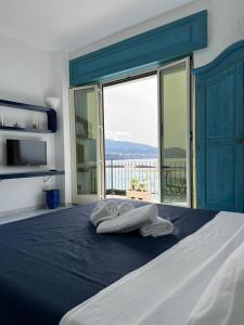 Ένα ή περισσότερα κρεβάτια σε δωμάτιο στο Residenza Mare di Sotto Sorrento