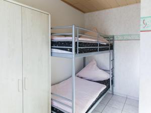 Ein Bett oder Betten in einem Zimmer der Unterkunft Apartment in Halenfeld near Ski Slope