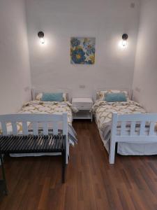 Cama o camas de una habitación en Ivy Rooms