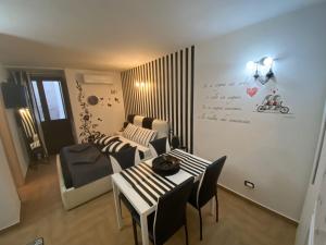 A seating area at Residence Emozioni Ortigia