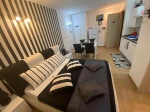 A kitchen or kitchenette at Residence Emozioni Ortigia