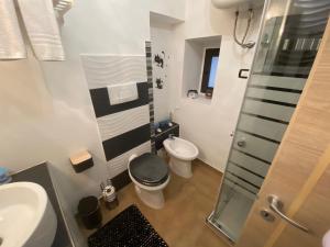 A bathroom at Residence Emozioni Ortigia