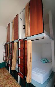 a group of bunk beds in a room at República Hostel Cartagena in Cartagena de Indias
