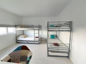 A bed or beds in a room at Private villa with pool in Lajares Még 34 kép