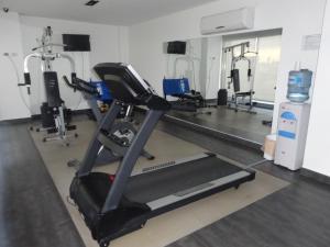 a gym with several treadmills and a treadmill at Sissi Apart in Buenos Aires