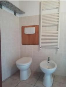 Ένα μπάνιο στο PIAZZETTA DEL FORNO GRAZIOSO BILOCALE ad ASSERGI