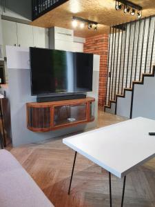 Телевизор и/или развлекательный центр в Apartament Hania
